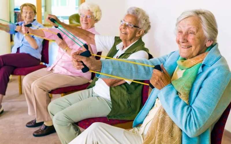 Four old ladies dementia patients are doing some useful activities at NV Memory Care