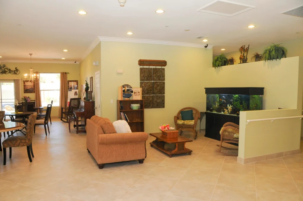 A living room with a fish tank designed for memory care activities.